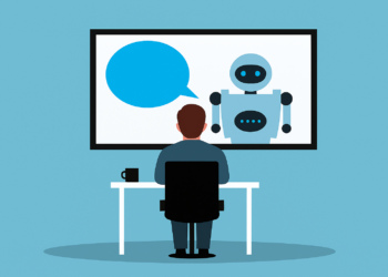 a man interacting with an AI agent on a screen, representing Perplexity AI Agents automating enterprise workflows.